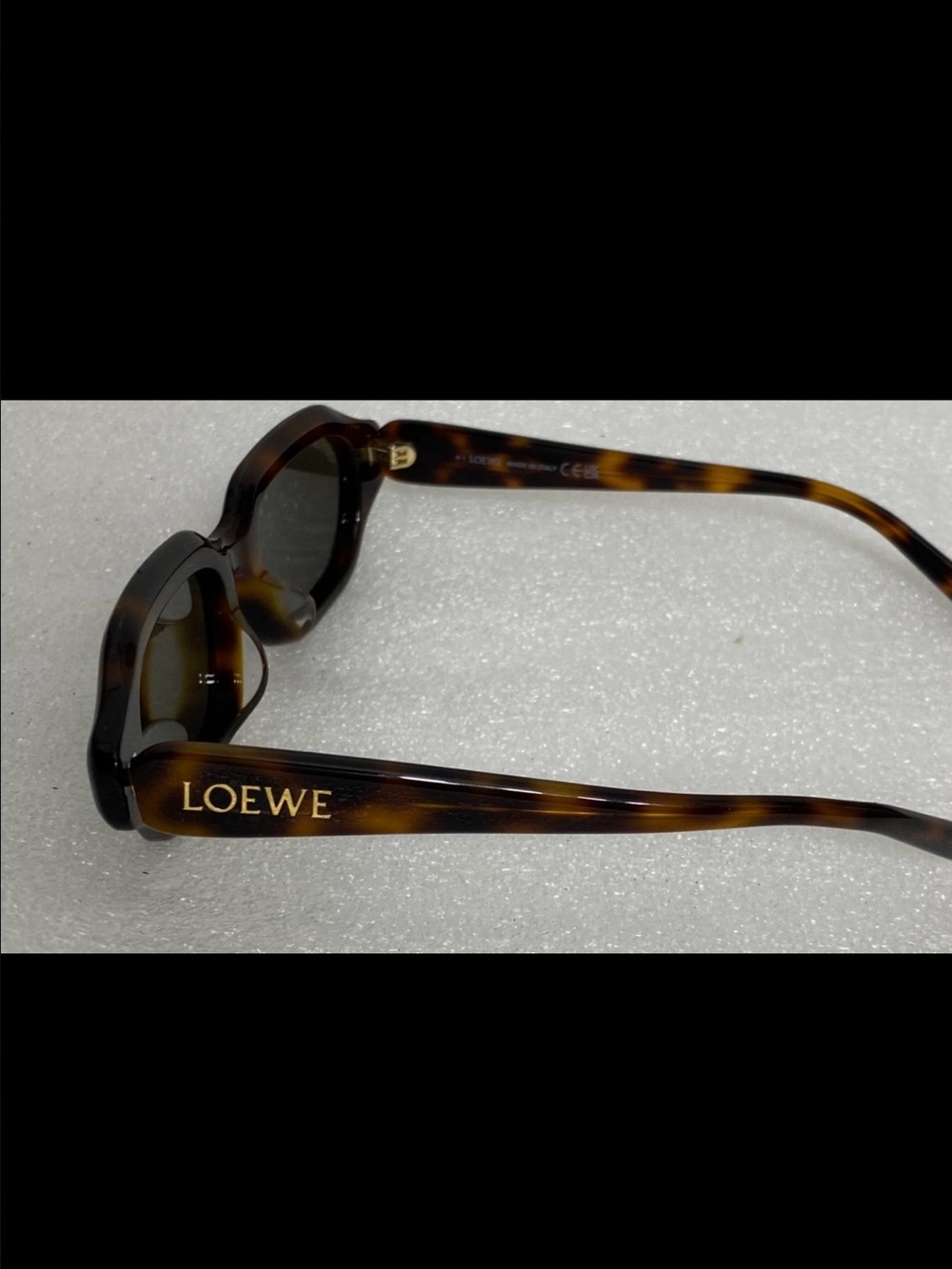 Loewe Rectangular-frame tortoiseshell acetate sunglasses. Made in Italy.